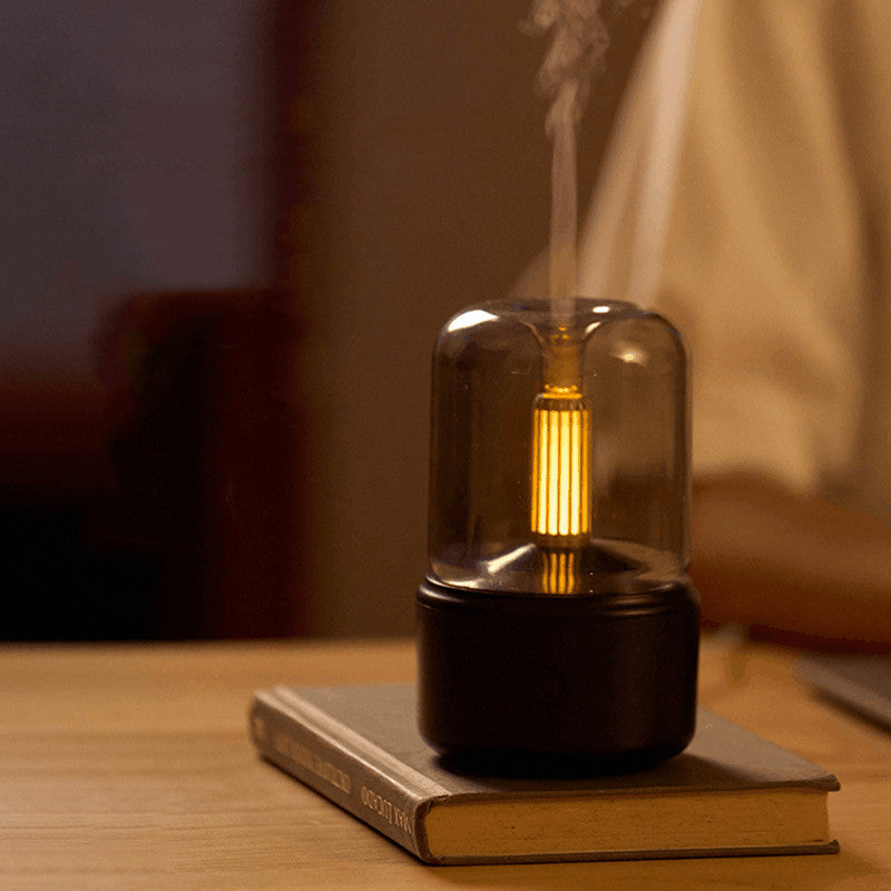 Humidificador portátil tipo vela LED color rosa — luz nocturna suave
