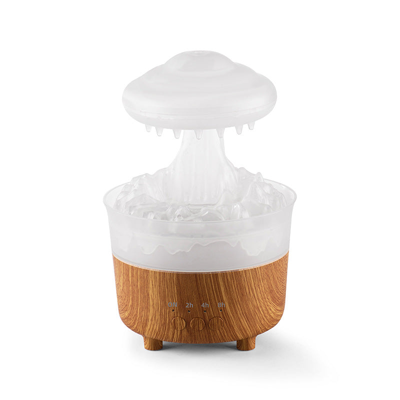Humidificador nube de lluvia en dormitorio infantil — luz nocturna suave
